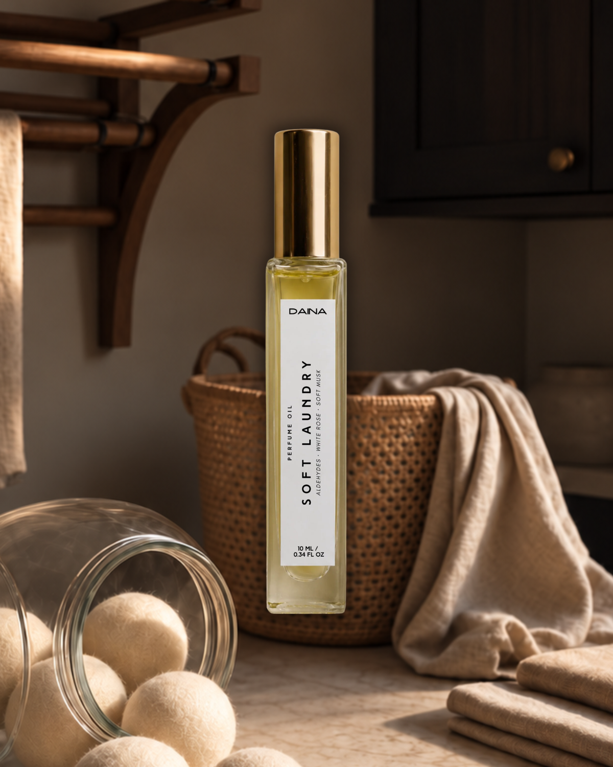 DAINA Soft Laundry perfume oil, a soft freshly washed laundry-inspired fragrance in a 10 ml roller bottle